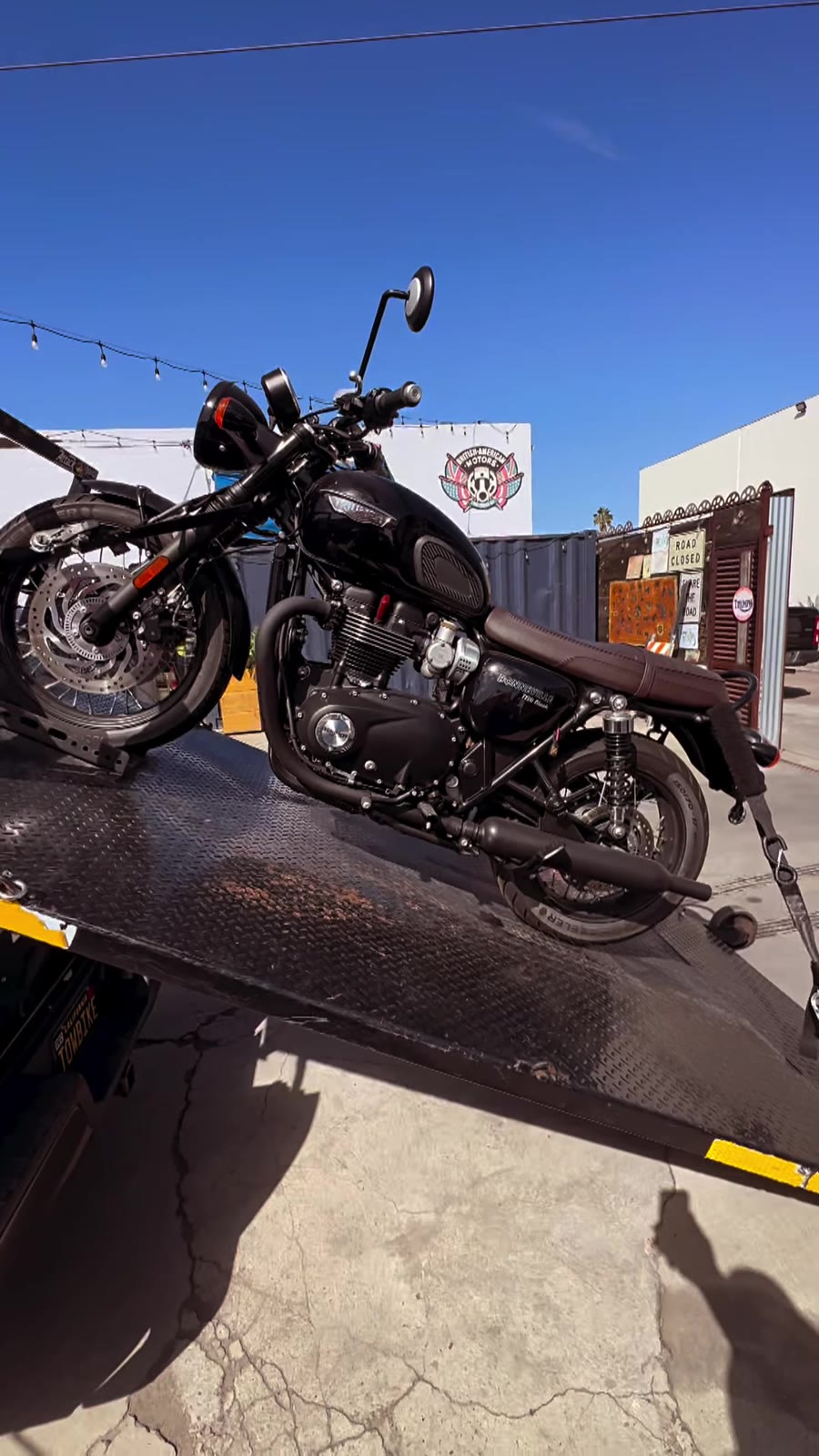 Triumph Bonneville on black tow ramp